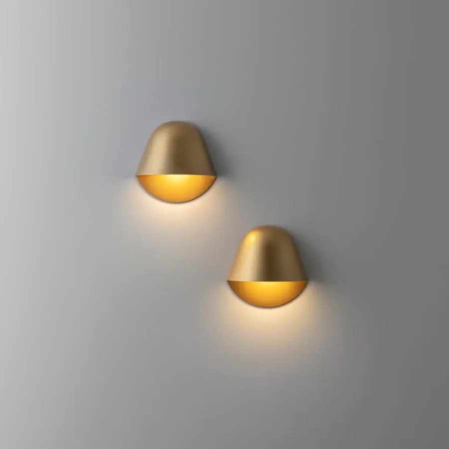 Elegant Penta Enoki wall lamp crafted in Italy with matt varnished golden metal and curved geometric lines