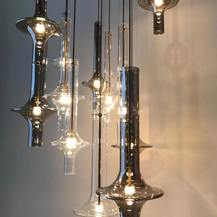 Distinguished Penta Wonder suspension lamp with transparent hourglass-shaped borosilicate glass shades and gold-toned metal connectors