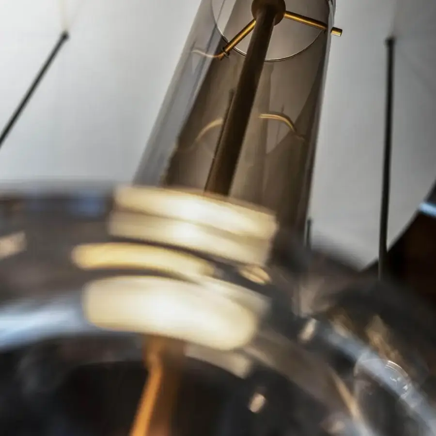 Distinguished Penta Wonder suspension lamp with smoky gray translucent borosilicate glass shade and matt varnished gold metal structure