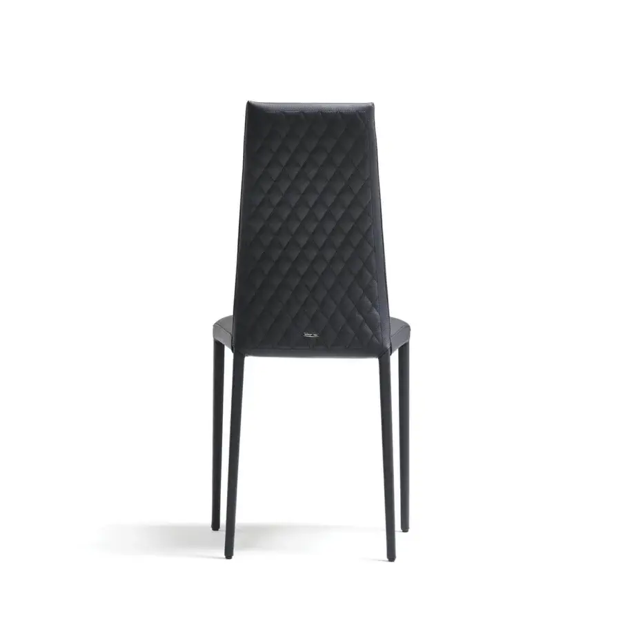 Distinguished Cattelan Italia Kay chair fully upholstered in dark fabric with quilted diamond pattern backrest and slender tapered legs