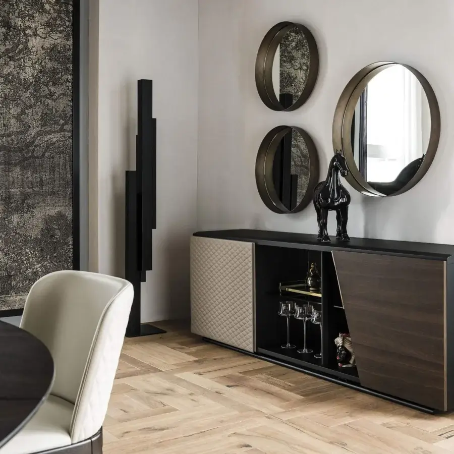 Elegant Cattelan Italia Aston sideboard with black embossed wood and steel, plus quilted leather and brushed bronze doors