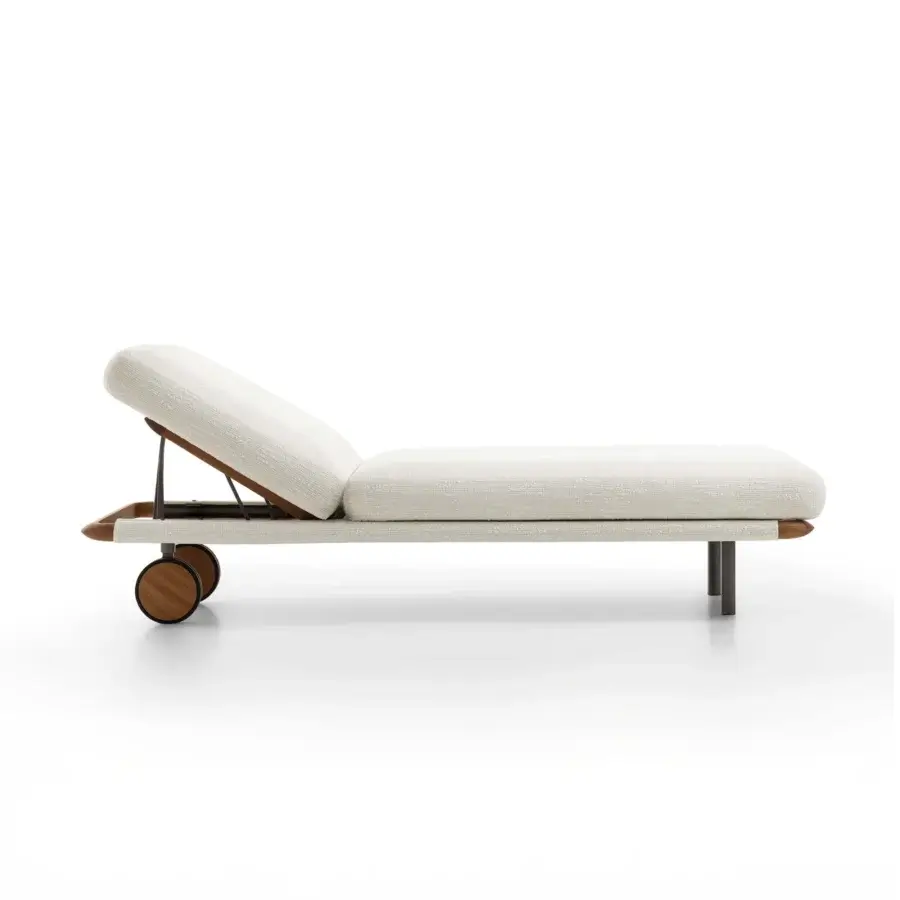 Exceptional Giorgetti Moorea lounger crafted with pewter painter stainless steel and painted Teak, upholstered in off-white Open-Air fabric