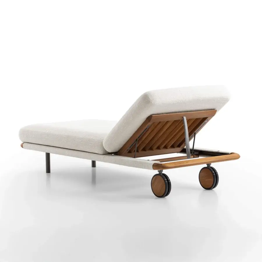 Superior Giorgetti Moorea lounger with pewter painter stainless steel frame and painted Teak inserts in textured neutral beige upholstery
