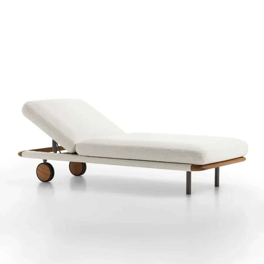 Elegant Giorgetti Moorea lounger with pewter painter stainless steel frame and painted Teak inserts in subtly textured off-white fabric