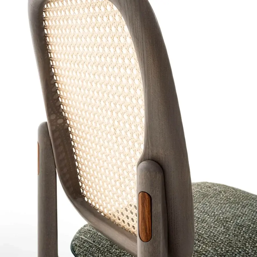 Exceptional Giorgetti Plume chair with solid ash wood, Viena straw backrest, and dark green textile upholstery with leather piping
