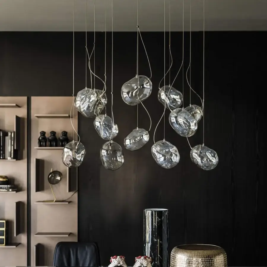 Exceptional Cattelan Italia Cloudine suspension lamp with organically shaped clear blown glass shades and fumé finish