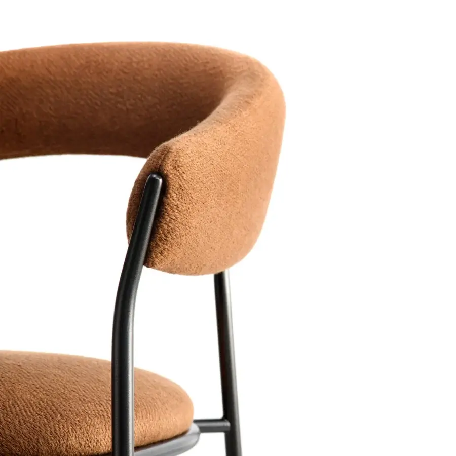 Superior MDF Italia Archie armchair with gently curved backrest upholstered in warm earthy brown woven textile and slender dark-toned metal legs