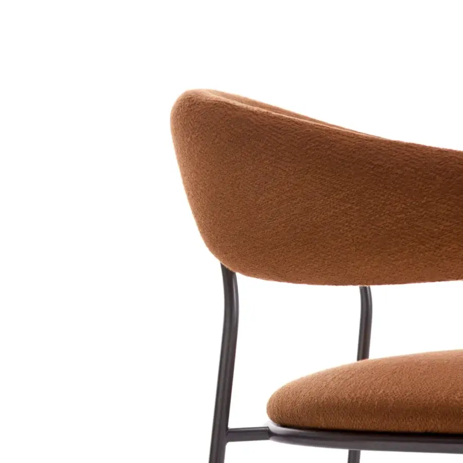 Distinguished MDF Italia Archie armchair with fluid form upholstered in earthy brown textile and sleek dark matte metal frame