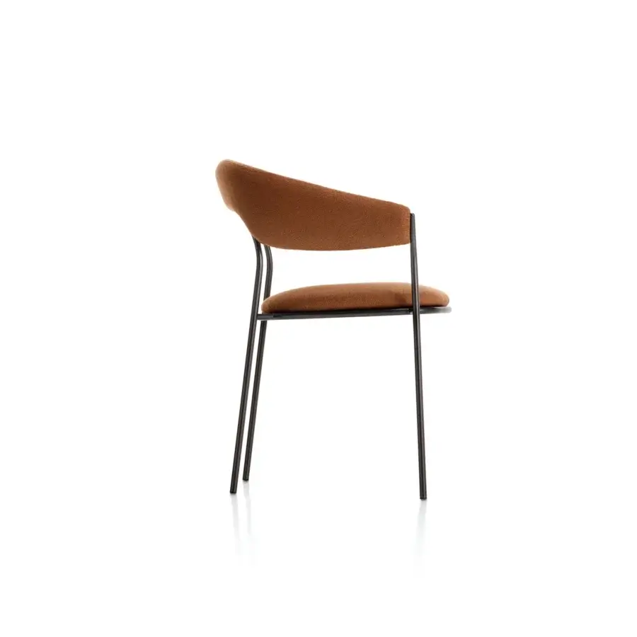 Elegant MDF Italia Archie armchair with a sleek metal frame and textured textile upholstery in warm brown finish