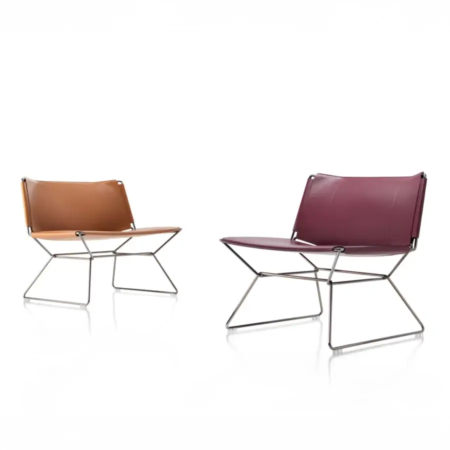 Lavish MDF Italia Neil lounge chair with a steel wire frame and full-grain medium brown leather cover crafted with tone-on-tone dyed edges