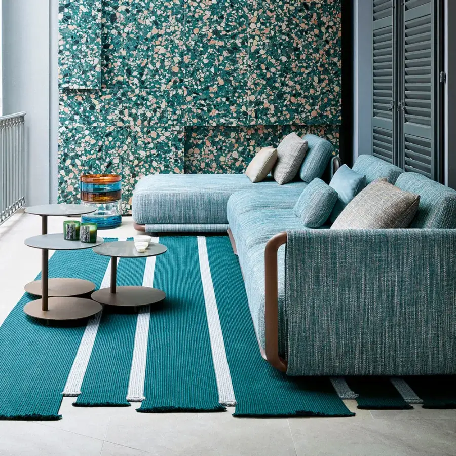 Exceptional Giorgetti Moorea sectional with pewter painted stainless steel and teak, upholstered in textured teal with accent cushions