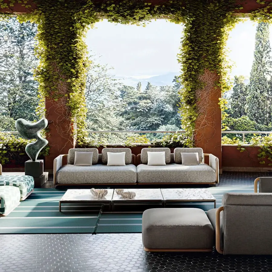 Distinguished Giorgetti Moorea sectional with pewter painted stainless steel, teak inserts and removable gray upholstery accented with teal, green, white patterns