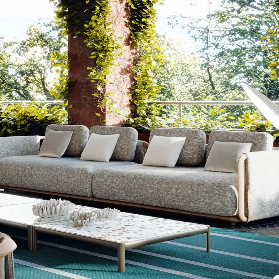 Elegant Giorgetti Moorea sectional with a pewter painted stainless steel frame and heathered neutral gray woven fabric upholstery