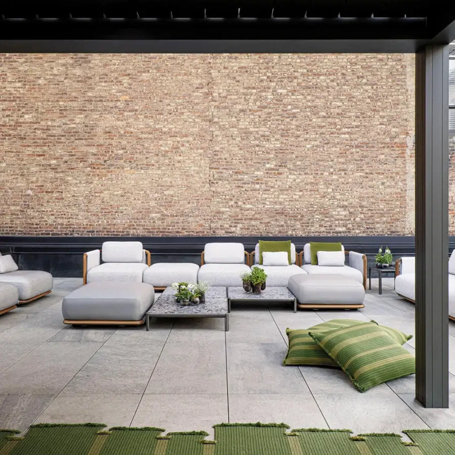 Distinguished Giorgetti Moorea sectional with pewter painted stainless steel and teak, upholstered in light gray outdoor fabric with green striped cushions