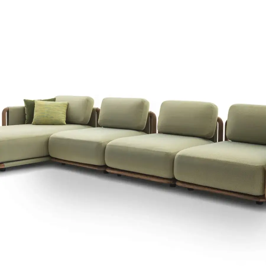 Distinguished Giorgetti Moorea sectional with pewter stainless steel frame and painted Teak, upholstered in olive green Open-Air fabric with patterned cushions