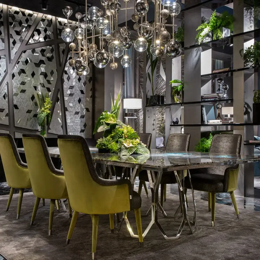 Elegant Sicis Borgia table with glossy grey marble tabletop and polished metal base creating captivating texture