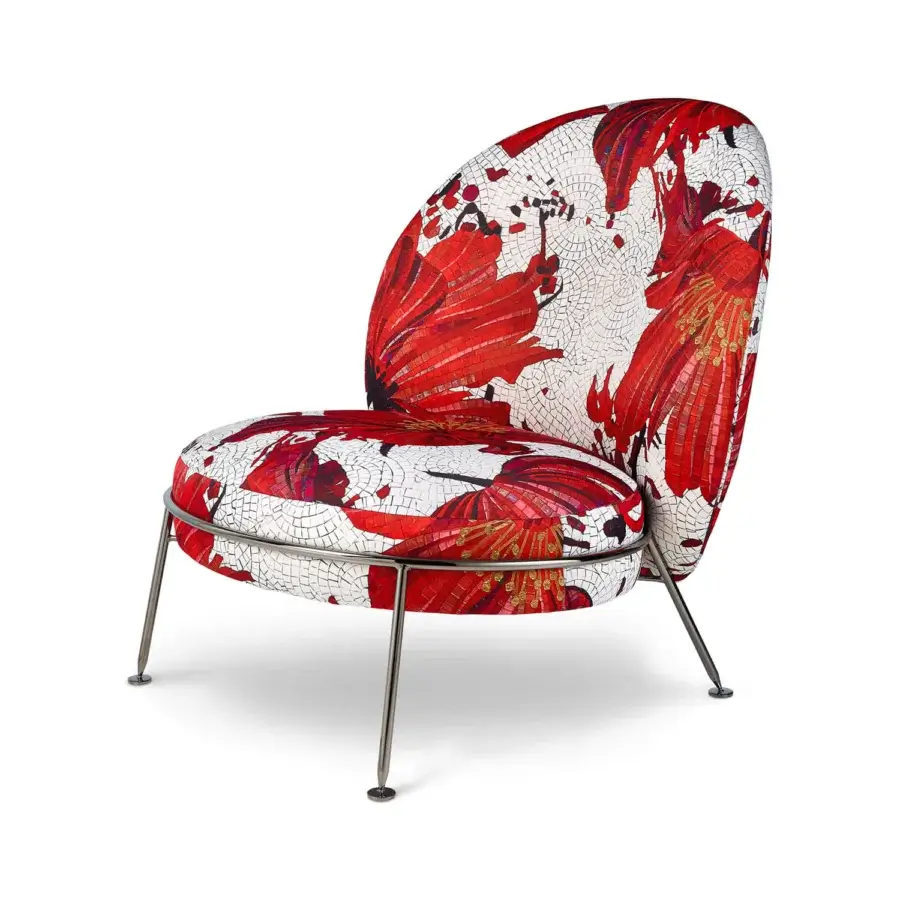 Exceptional Sicis Amaretto art lounge chair with red and white patterned textile and sleek coated metal base