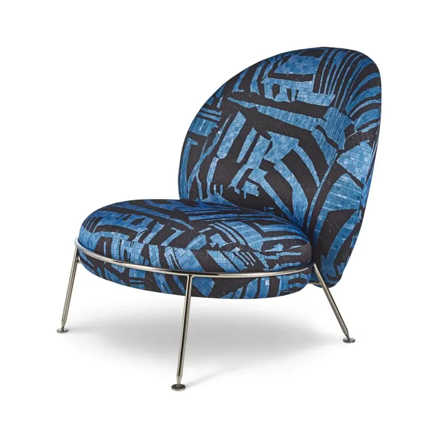 Superior Sicis Amaretto art lounge chair with dark textile upholstery and bright blue abstract foliage pattern