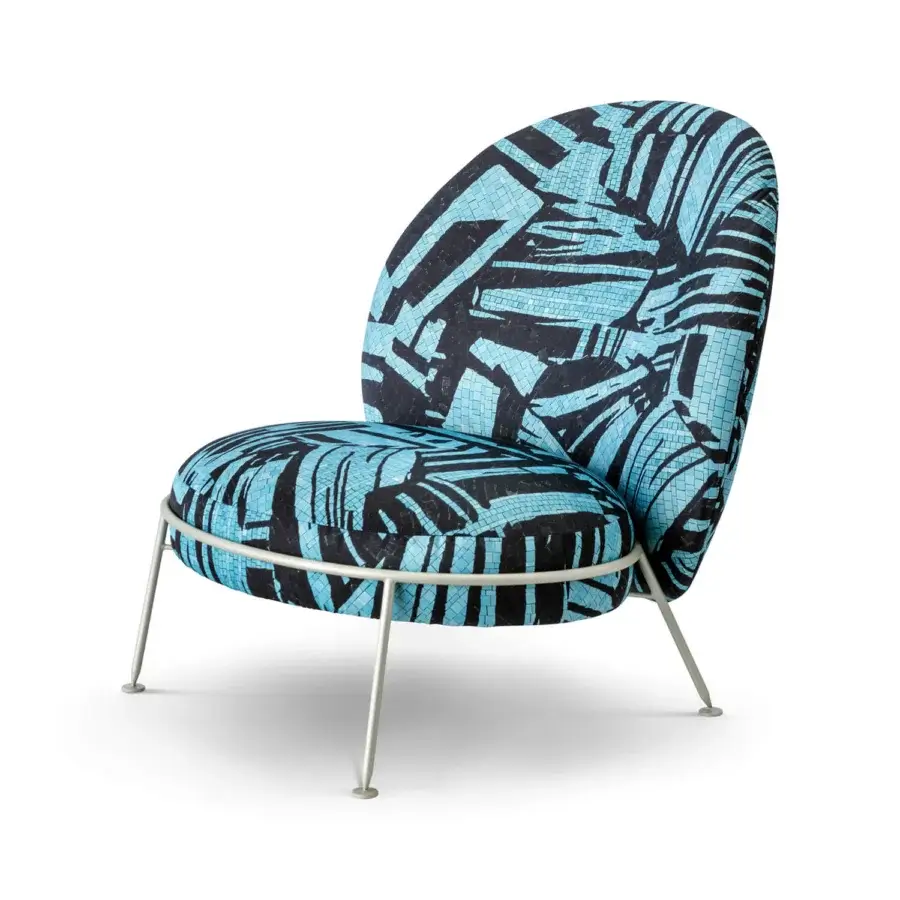 Captivating Sicis Amaretto art lounge chair upholstered in abstract blue and black textile with satin-finished metal base
