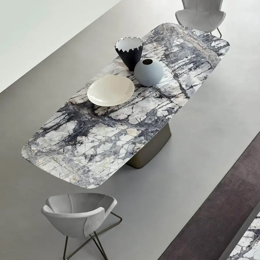Exceptional Arketipo Icon table with shaped Slate Grey marble top and micaceous brown varnished metal pedestal base