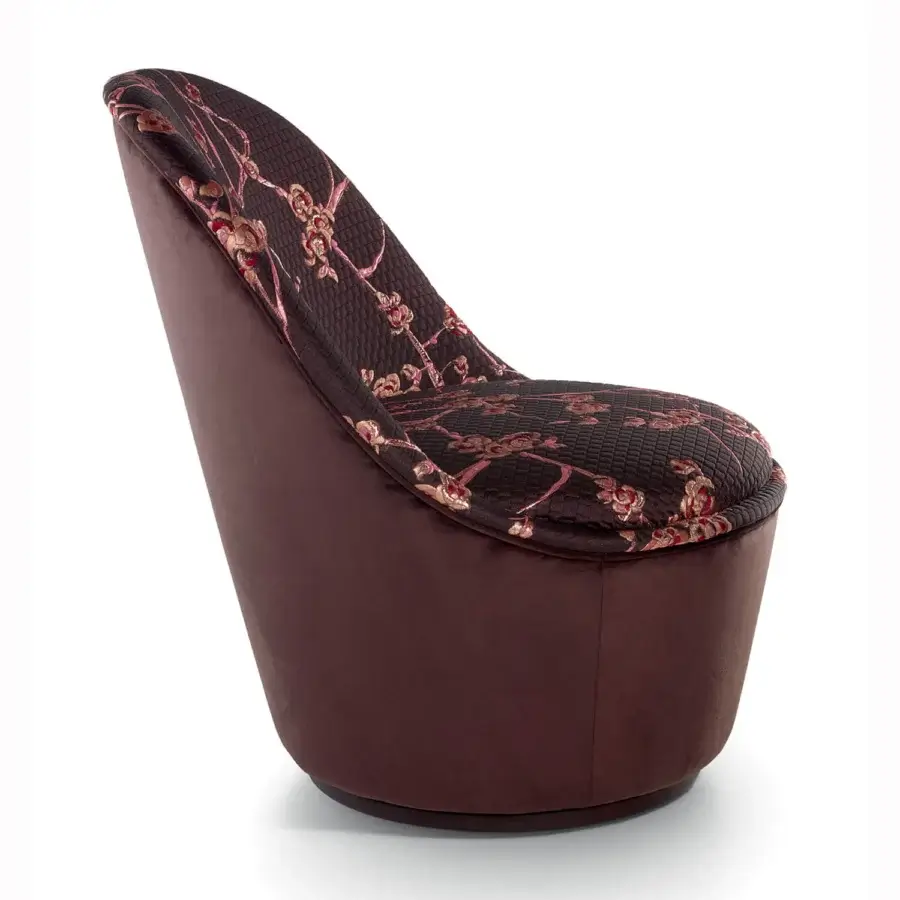 Sumptuous Sicis Blossom lounge chair with dark reddish-brown velvet upholstery and pink-red floral textile crafted with a circular motion base