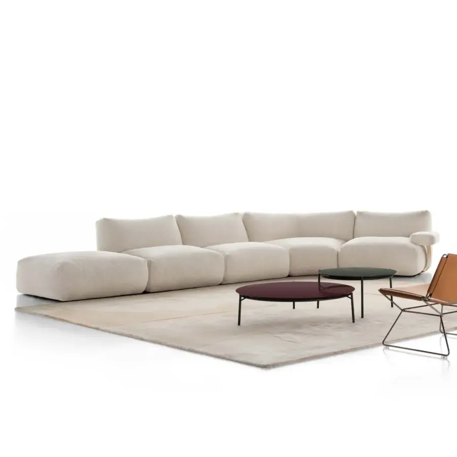 Exceptional MDF Italia Goom sectional with light beige textured textile and rounded edges creating a floating effect