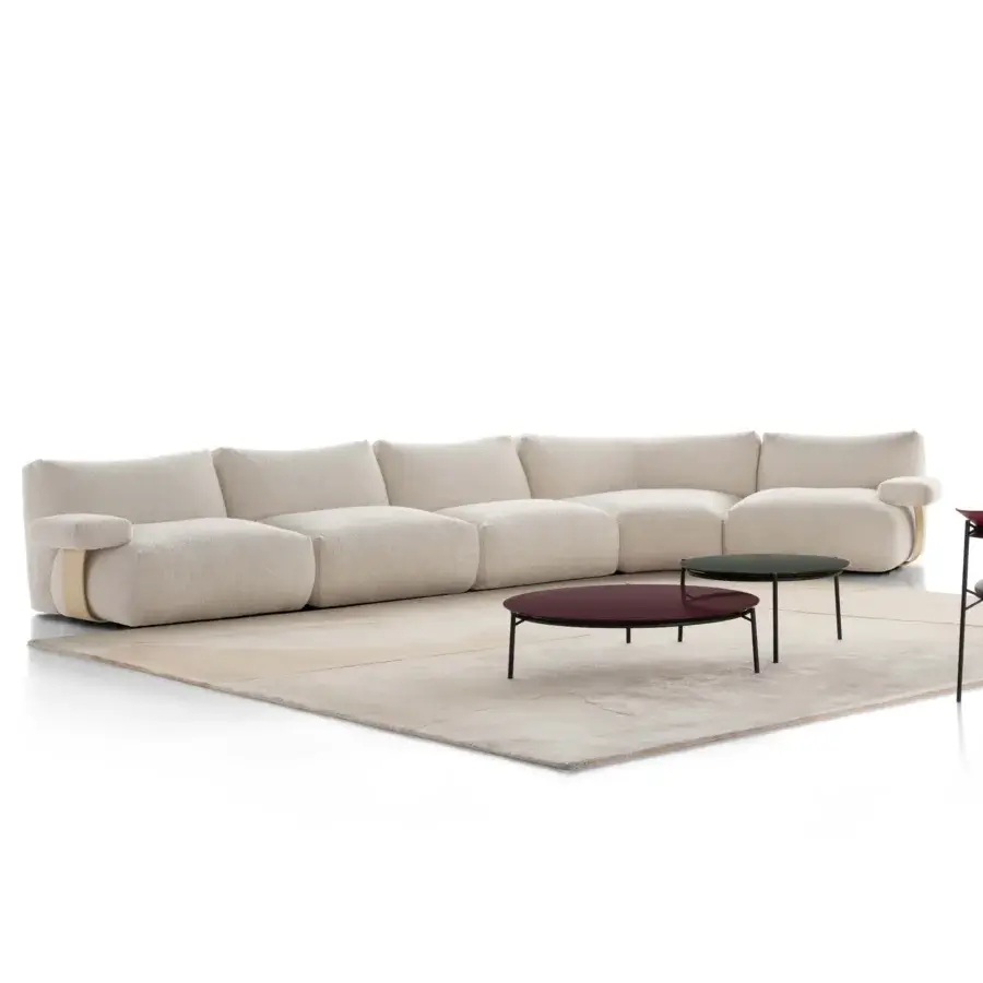 Lavish MDF Italia Goom sectional built with a wooden structure and upholstered in matte textured woven fabric with light brown accents