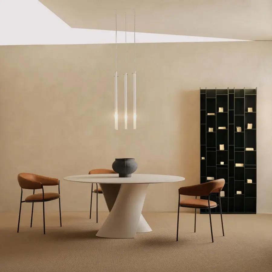 Elegant MDF Italia S table crafted in white concrete with a smooth matte finish and flowing lines