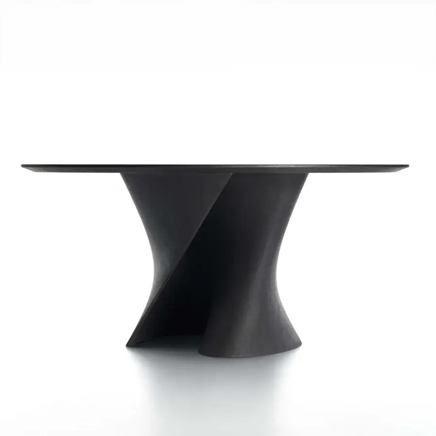 Distinguished MDF Italia S table crafted in white concrete with a tactile matte finish and transparent glass top