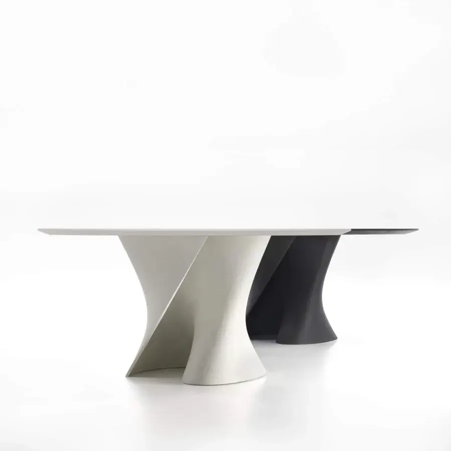 Superior MDF Italia S table crafted in white and anthracite concrete with a transparent extra-clear glass top and sculptural curves