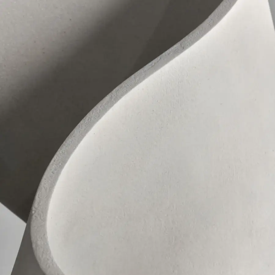 Superior MDF Italia S table crafted in white concrete with a transparent glass top and tactile matte finish