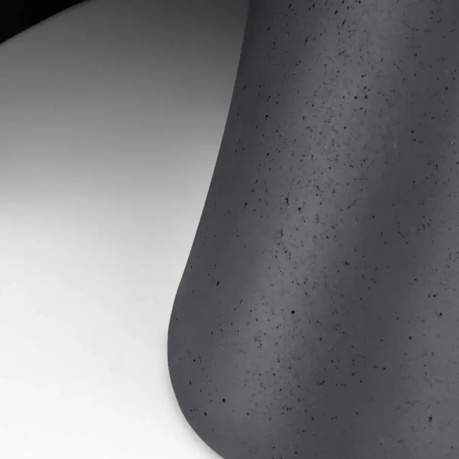 Exceptional MDF Italia S table crafted in dark anthracite concrete with a speckled surface and transparent glass top