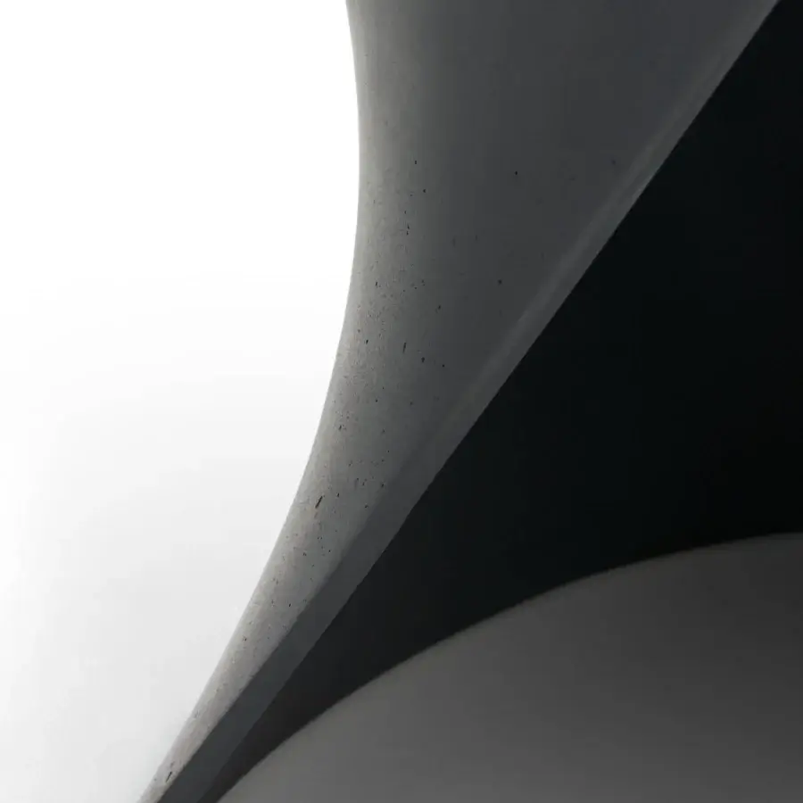 Superior MDF Italia S table crafted in white and anthracite concrete with a tactile matte finish