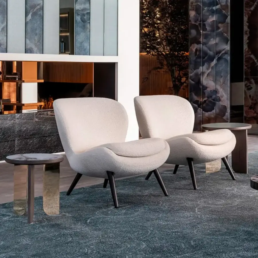 Superior Sicis Niels lounge chair with textured light neutral beige textile upholstery and subtly flared dark-toned wood legs