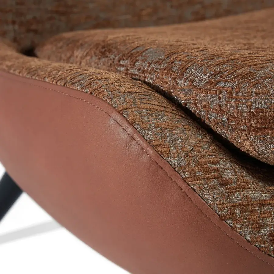 Superior Sicis Niels lounge chair crafted in Italy with warm brown textile and reddish-brown leather detailing with dark-toned wood legs