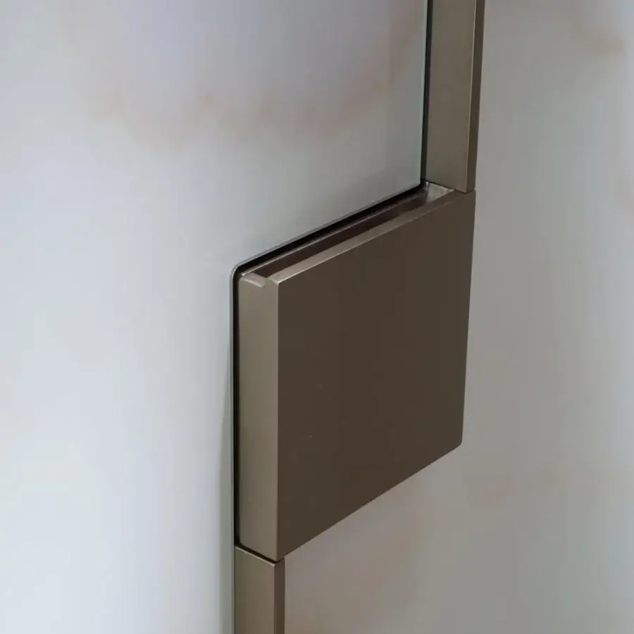 Sophisticated Reflex Musa cupboard with geometric forms built in wood and Marble glass with a bronze finish