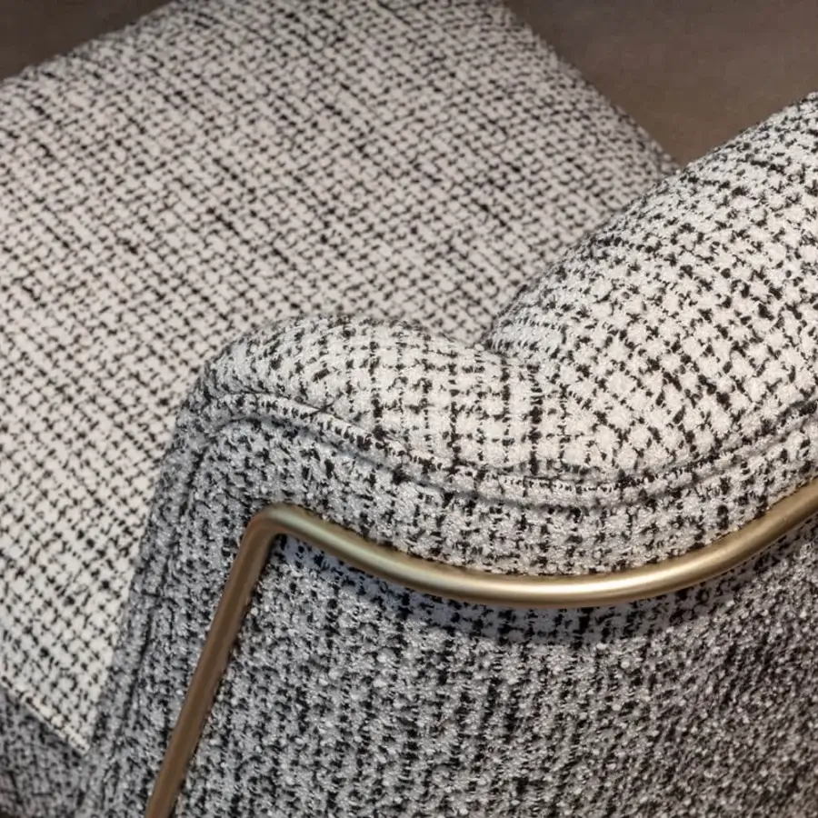 Distinguished Sicis Peggy lounge chair with black and white textured textile upholstery and metallic frame
