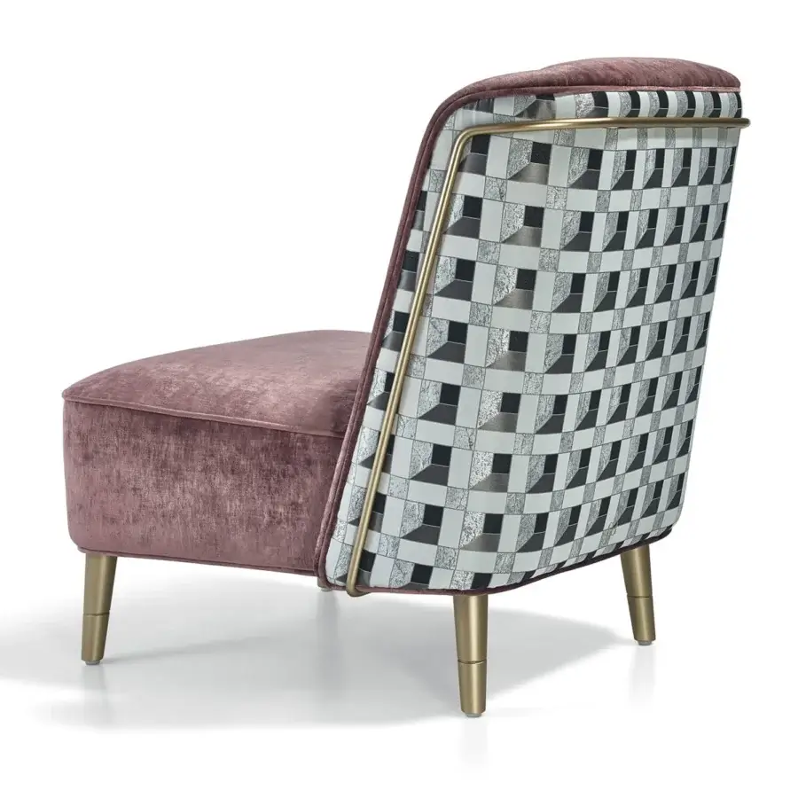Distinguished Sicis Peggy lounge chair with soft muted rose velvet upholstery and geometric white, gray, black backrest built with polished gold-toned metal