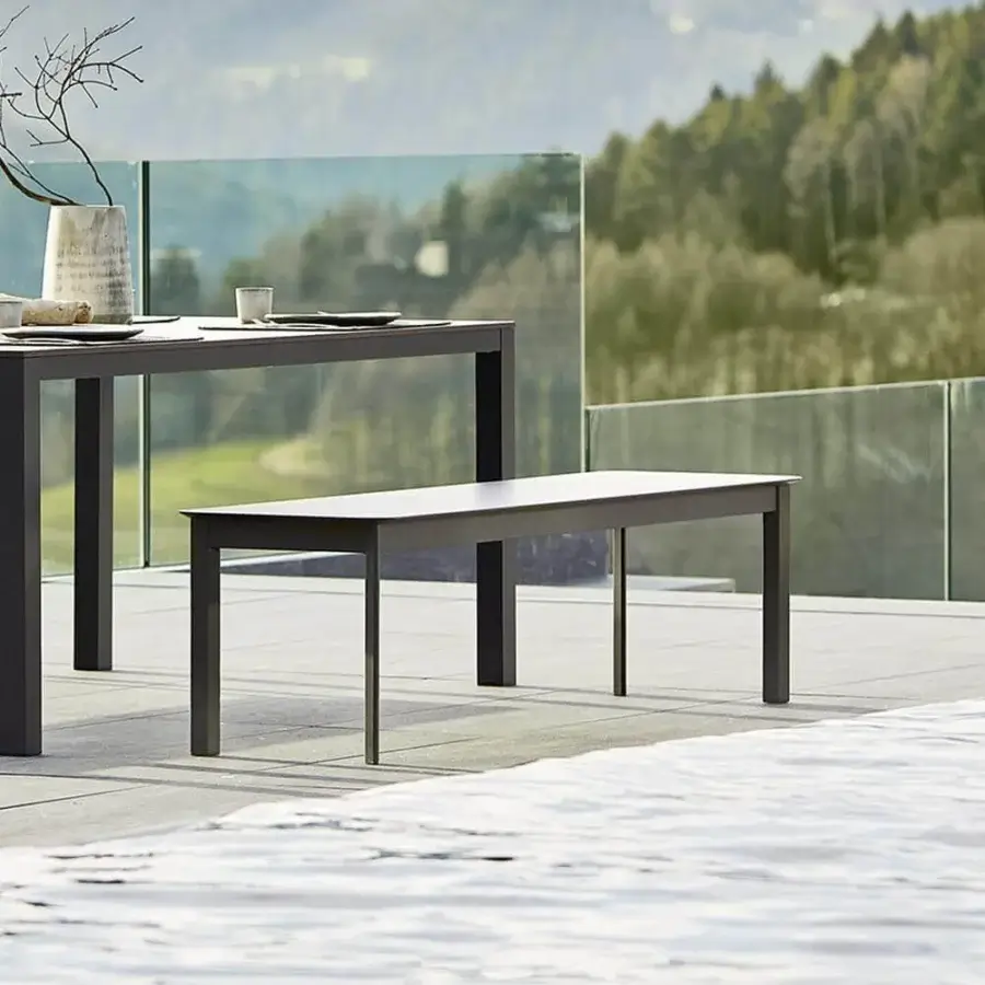 Sophisticated Varaschin System bench with dark gray HPL seat and powder-coated aluminum frame embodies refined Italian design