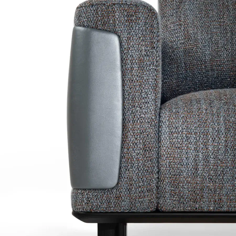 Exclusive Giorgetti Nereide Sofa – Maserati Edition sofa built with textured blue textile and matte grey leather armrests with a dark stained finish