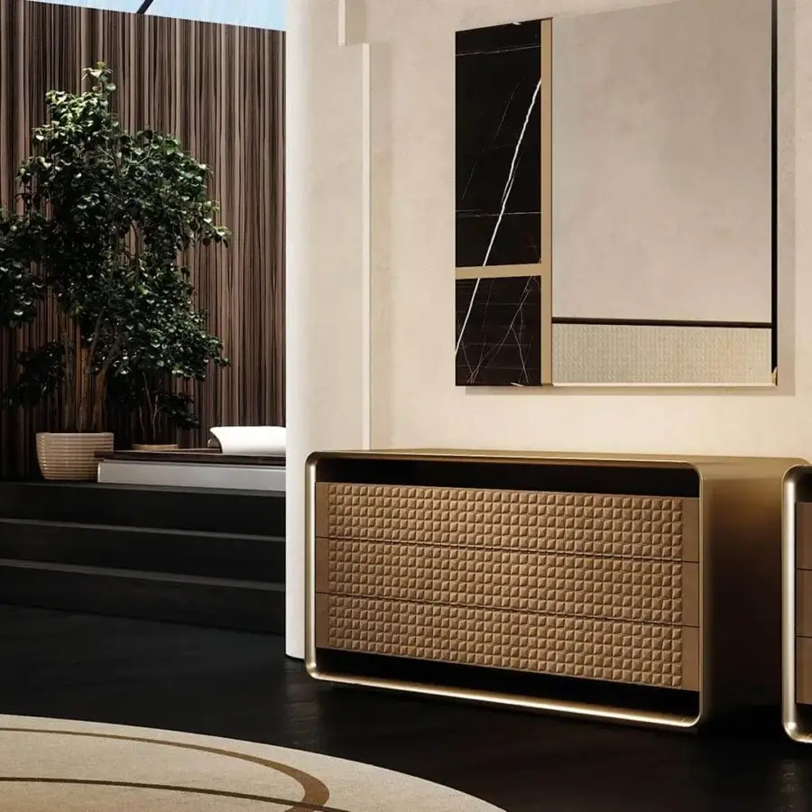 Sophisticated Reflex Oh dresser with shaped rounded wood, satin metallic brass finish and quilted Leather Naturale drawers