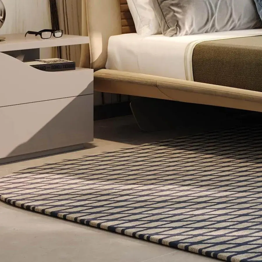 Distinguished Reflex Segno nightstand with a lacquered wooden structure and curved front edge, exhibiting modern sophistication