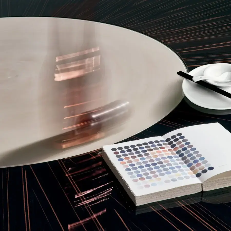 Superior Sicis Koro table crafted with wood inserts, a Vetrite glass top and a pale, neutral finish