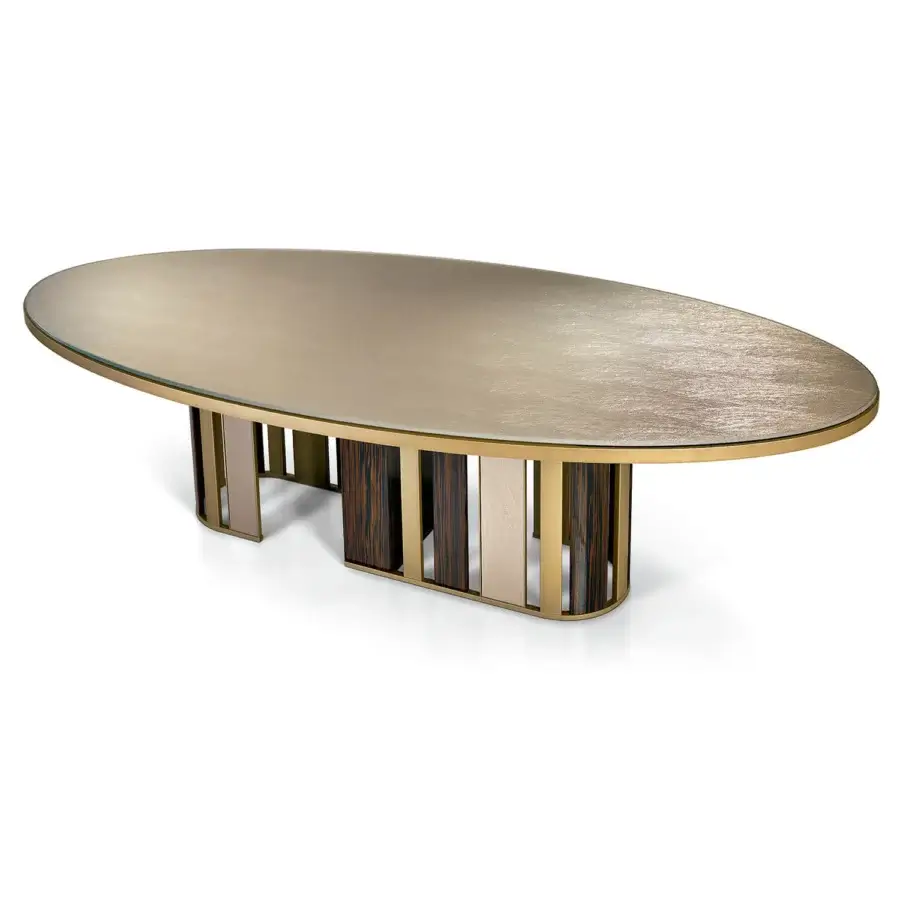 Exceptional Sicis Koro table with oval glass top and dynamic circular metal and ebony frame in brushed gold and satin finish