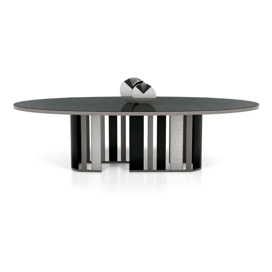 Superior Sicis Koro table with sleek oval glass top and dynamic circular metal with ebony base