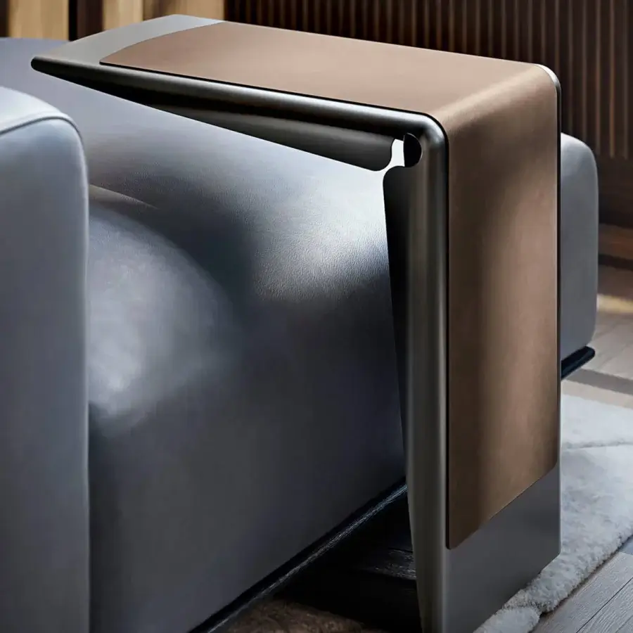 Distinguished Giorgetti Nereide sectional with muted gray leather upholstery and a pewter-coated ash wood base crafted with a built-in side table