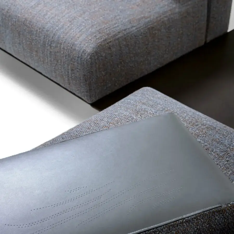 Exceptional Giorgetti Nereide sectional crafted with textured blue and gray textile, solid ash wood, and adjustable pewter-finished metal feet