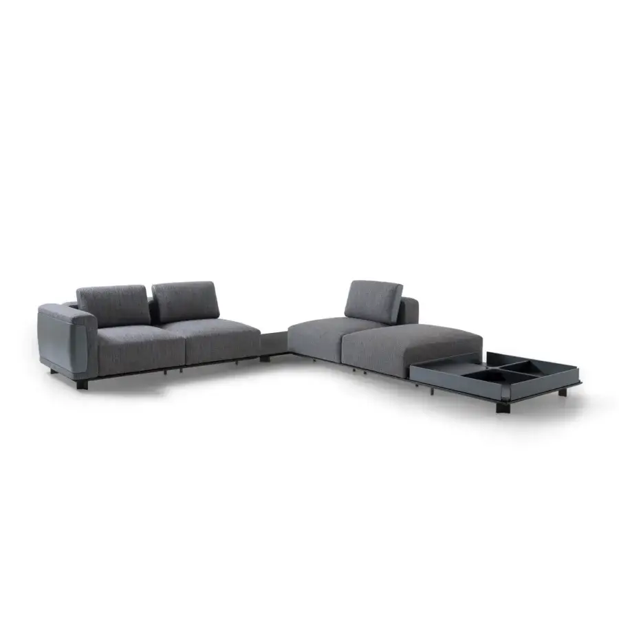 Sophisticated Giorgetti Nereide sectional with medium gray textile upholstery and a solid ash wood platform built with pewter-coated metal legs