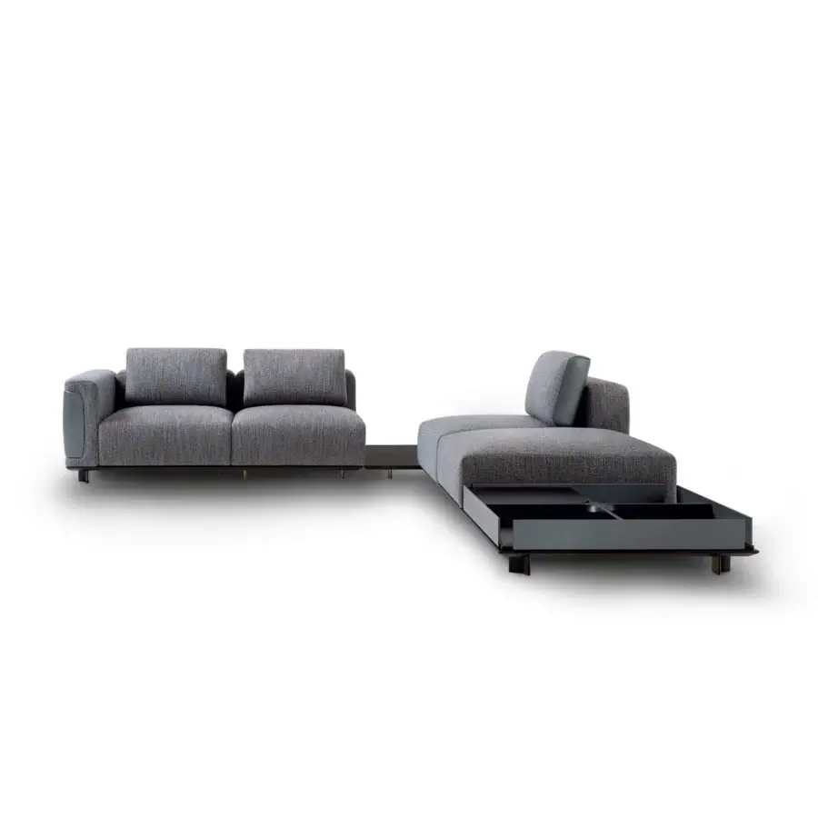 Distinctive Giorgetti Nereide sectional with muted gray-blue textile upholstery and a solid ash wood frame built with Pewter finished metal legs