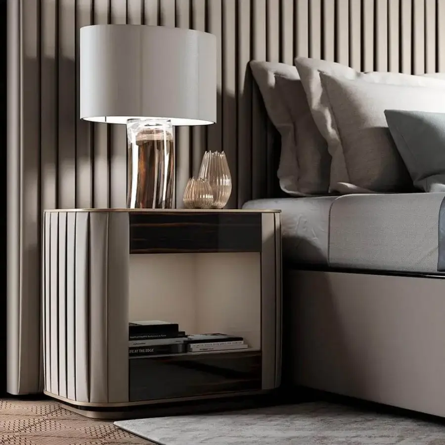 Exceptional Reflex Plissé XL bed with light beige padded upholstery and plissé finishing, accented with shiny metal and Ebony wood details